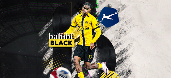 Bahibi Black, ein Fussballspieler im gelben Trikot, mit Ball in der Schweizer Super League
